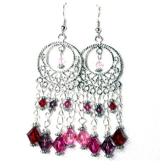 Pendientes largos con cristales en rosa y fucsia