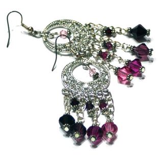 Pendientes largos con cristales en rosa y fucsia