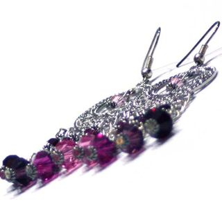 Pendientes largos con cristales en rosa y fucsia