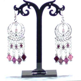 Pendientes largos con cristales en rosa y fucsia