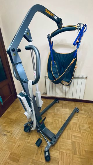 Grúa eléctrica con arnés