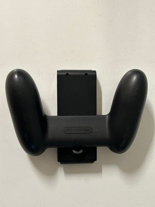 Nintendo Switch soporte y mandos verde y gris