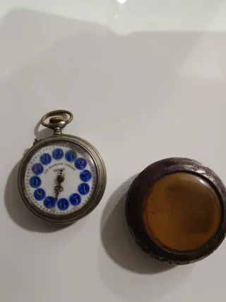 Reloj antiguo de pulsó