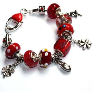 Pulsera para niñas con cuentas de flores.