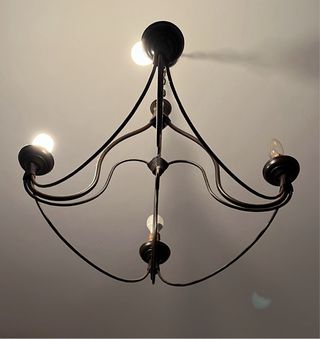 Dormitorio de madera maciza y forja