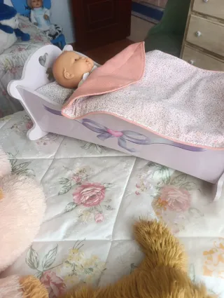 Mecedora de muñecas rosa con conejito