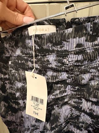 Falda corta lila y negra talla XS