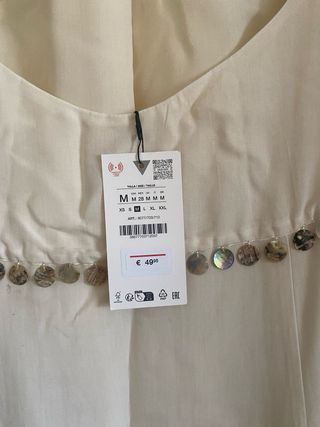 Vestido halter blanco con abalorios