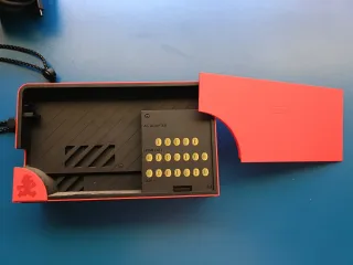 Nintendo Switch Mario Rojo + 2 fundas + monopoly