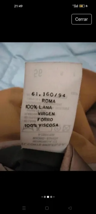 Americana beige oscura de Emidio Tucci.