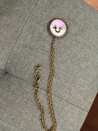 Conjunto de joyería: pulsera, pendientes y colgant