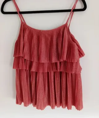 Blusa sin mangas con volantes y flecos