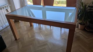 Tavolo da pranzo in vetro e legno