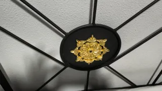 Cabecero de hierro forjado negro y dorado