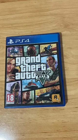 PS4 (PlayStation 4) con juegos y mandos