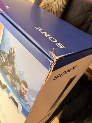 Caja PS5 con manuales