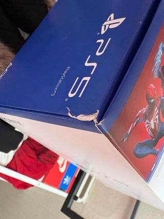 Caja PS5 con manuales