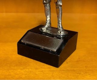 Figura pescador metal plata