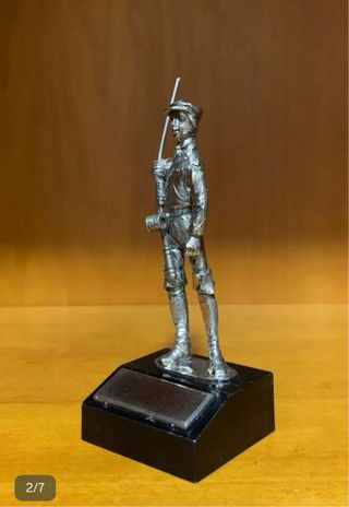 Figura pescador metal plata