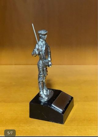 Figura pescador metal plata