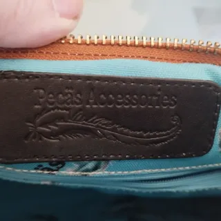 Bolso piel efecto metalizado animal print