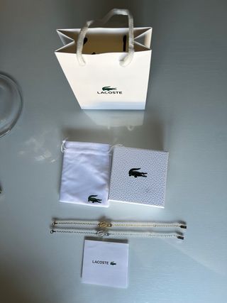 Pulseras Lacoste Dorada y Plateada