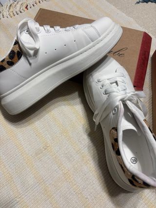 Scarpe pelle bianca con inserti animalier