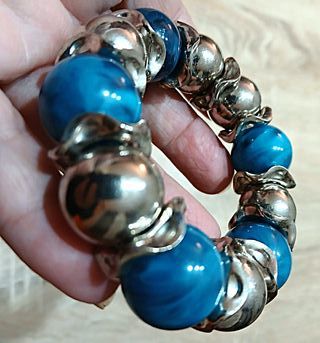 Bracciale regolabile con perle azzurre e argento