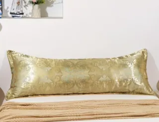 Funda de almohada dorada elegante