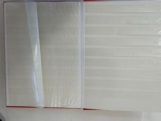 Álbum clasificador de sellos rojo con16 pag.