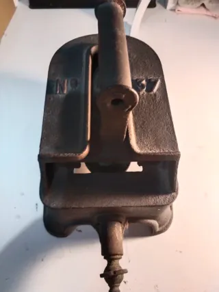 Plancha antigua de hierro fundido