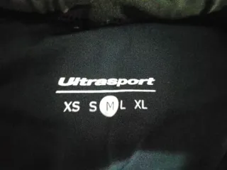 Leggings da corsa neri con dettagli turchesi