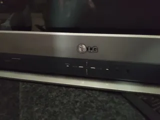 Televisión LG flatron con mando a distancia Gris