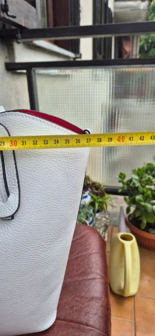 Borsa in vera pelle bianca con interno rosso