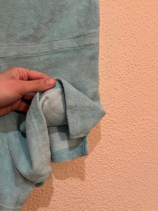 Mono azul tela toalla