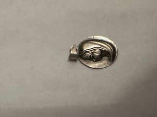 Lote medallas y pulsera religiosa plata