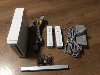 Nintendo Wii con 2 mandos y accesorios