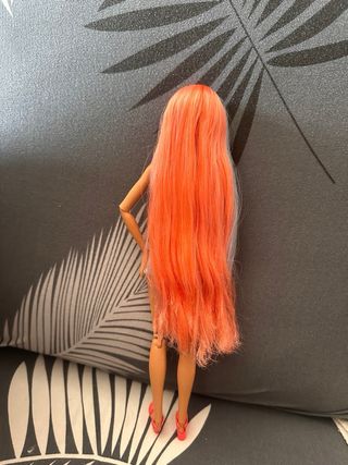 Barbie con traje de baño y shorts