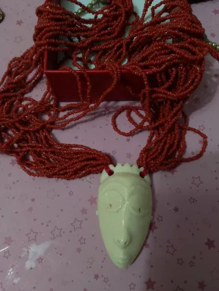 Preziosa collana antica con maschera