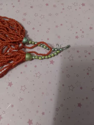 Preziosa collana antica con maschera