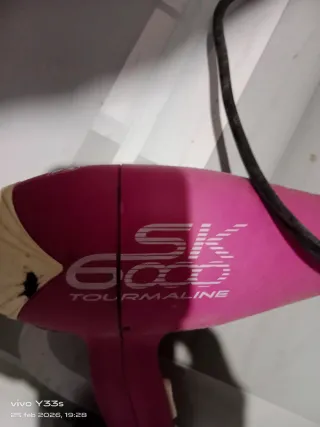 Secador de pelo SK rosa y beige