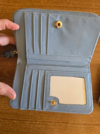 Monedero Tous azul/gris, rosa, negro.