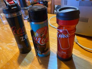 Borracce Coca-Cola in metallo e plastica