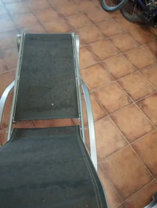 Tumbona de jardín metálica y de tela