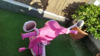 Triciclo niña rosa con sombrilla