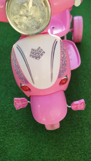 Triciclo niña rosa con sombrilla