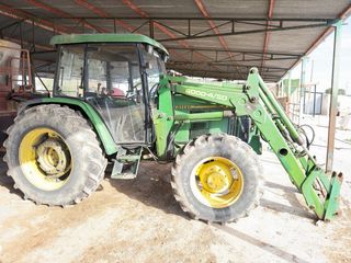 Tractor John Deere 6300 con pala
