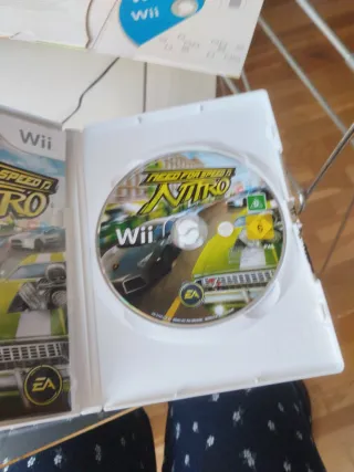 Mando Wii y juegos Wii Sports y Need for Speed
