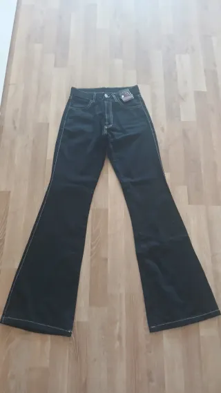 Calças ganga boca de sino tam 34