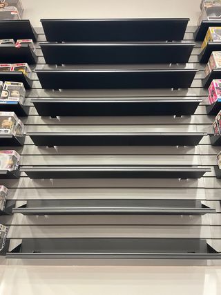 Estantería metálica para paneles ranurados